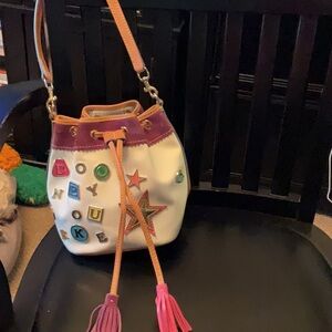Vibrant Bucket Bag with Tassels